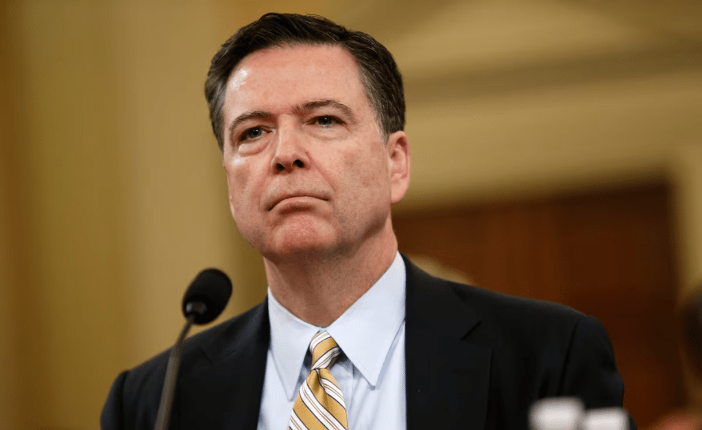 FBI Director James Comey waits before testifying at a House Intelligence Committee hearing into alleged Russian meddling in the 2016 U.S. election, on Capitol Hill in Washington, U.S., March 20, 2017. REUTERS/Joshua Roberts