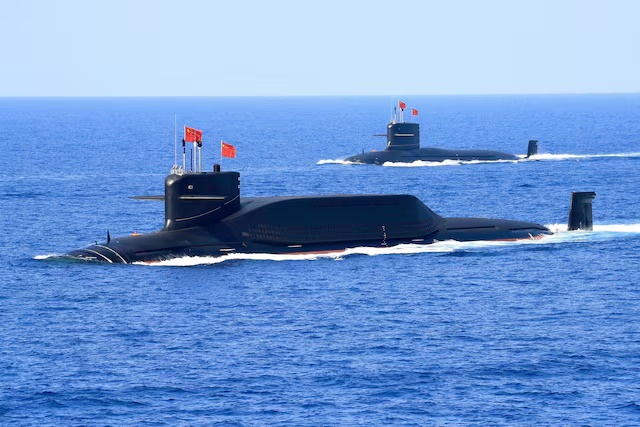 A nuclear-powered Type 094A Jin-class ballistic missile submarine of the Chinese People's Liberation Army (PLA) Navy in waters during a military display in the South China Sea April 12, 2018. REUTERS/Stringer/ File photo
