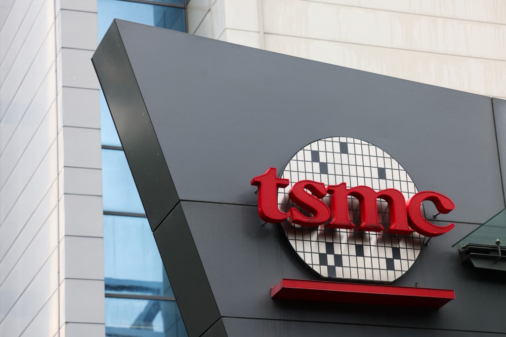 The logo of Taiwan Semiconductor Manufacturing Company (TSMC) is seen at its headquarters in Hsinchu on November 21, 2024.  Photo by I-HWA CHENG / AFP