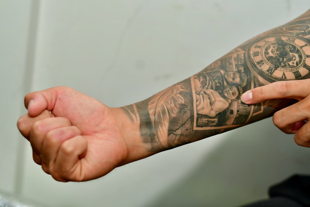 This file photo taken on September 14, 2020, shows a tattoo on the right arm of Ng Yet-hoi, a retired goalkeeper for the Hong Kong football team. This file photo taken on September 14, 2020, shows a tattoo on the right arm of Ng Yet-hoi, a retired goalkeeper for the Hong Kong football team.