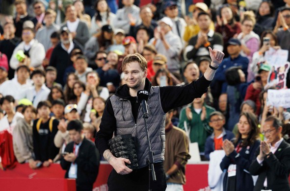 Alexander Bublik celebrates after beating world number seven Lorenzo Musetti to lift the trophy. AFP 