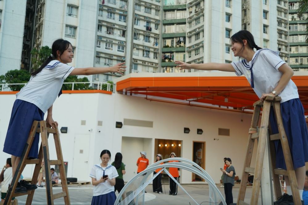Students from Po Chiu Catholic Secondary School work together to create their dream playground. THE WHARF
