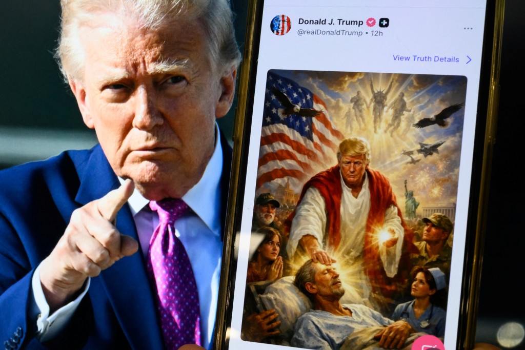 Photo by MANDEL NGAN / AFP This photo illustration created on April 13, 2026 shows a picture of US President Donald Trump on a screen and an AI-generated picture he posted on his Truth Social platform depicting himself as Jesus Christ after criticizing Pope Leo XIV.