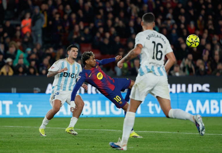 Lamine Yamal scores Barcelona's third goal against Real Oviedo at Camp Nou. AP