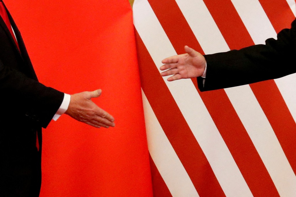 U.S. President Donald Trump and China's President Xi Jinping shake hands after making joint statements at the Great Hall of the People in Beijing, China, November 9, 2017. REUTERS/Damir Sagolj