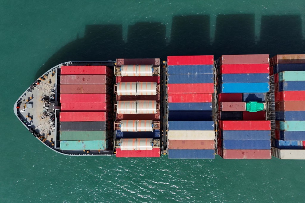 A drone view shows a cargo ship at Kwai Tsing Container Terminals in Hong Kong, China. REUTERS