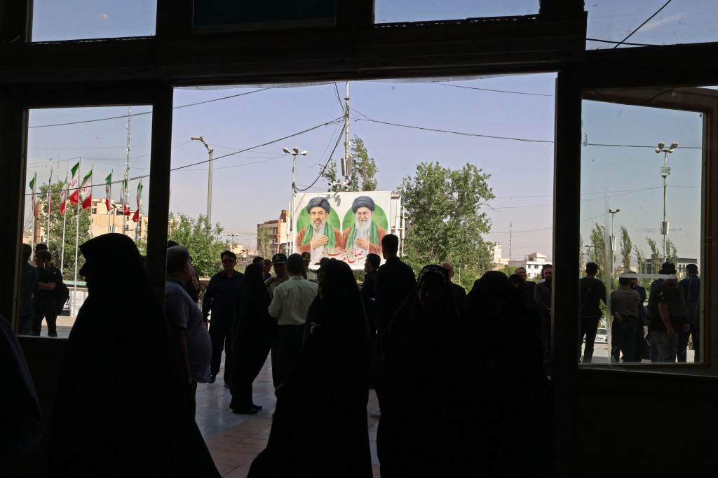 Iranians gather at the Imam Khomeini Mosque (Mosalla) to commemorate those killed in former wars and also those killed during the latest US-Israel led war, in Tehran on May 24, 2026. (AFP)