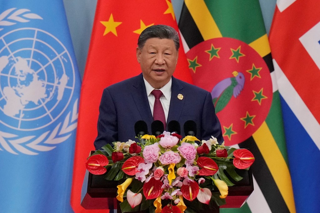 China's President Xi Jinping speaks during a opening ceremony of the Global Women’s Summit 2025 at China National Convention Center on October 13, 2025 in Beijing. (Reuters)
