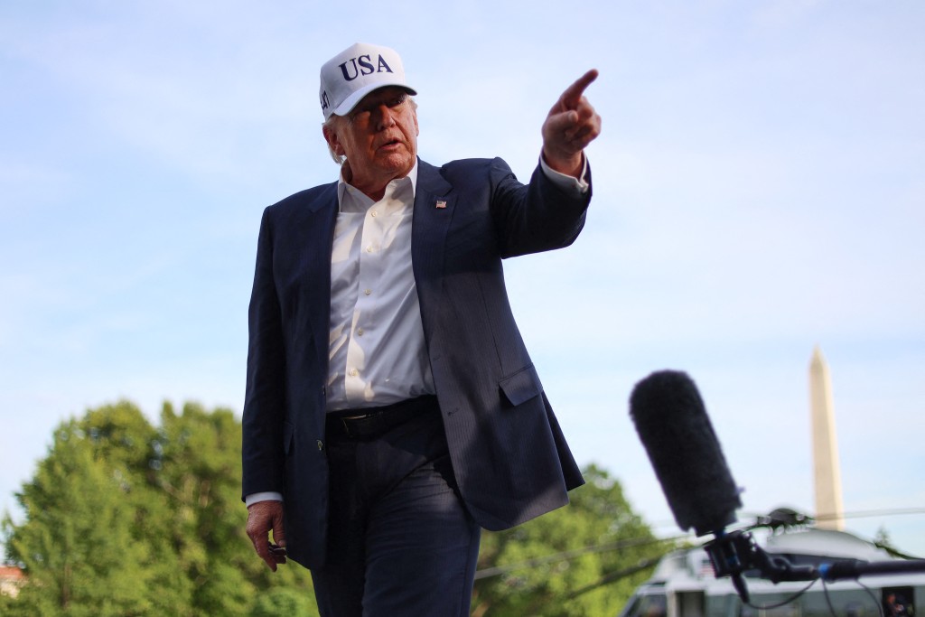 US President Donald Trump gestures as he speaks to reporters after arriving on the South Lawn of the White House in Washington, DC, on May 15, 2026. (AFP/File)