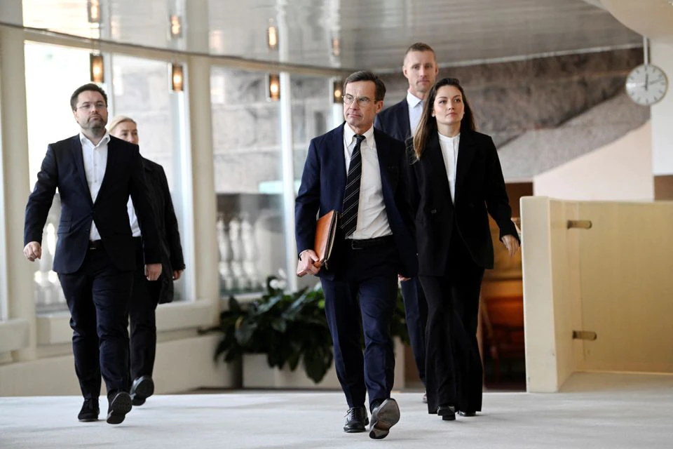 Sweden's Moderate Party leader Ulf Kristersson walks, after being confirmed as new prime minister, in Stockholm. (Reuters) Sweden's Moderate Party leader Ulf Kristersson walks, after being confirmed as new prime minister, in Stockholm. (Reuters)