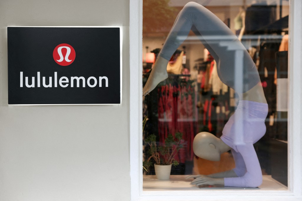  A logo is displayed outside a Lululemon outlet retail store at Bicester Village in Oxfordshire, Britain, August 21, 2024. REUTERS/Hollie Adams