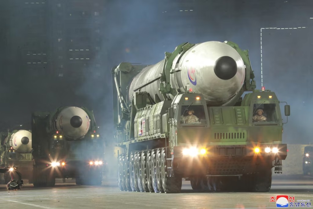  Hwasong-17 intercontinental ballistic missiles take part in a nighttime military parade to mark the 90th anniversary of the founding of the Korean People's Revolutionary Army in Pyongyang, North Korea, in this undated photo released by North Korea's Korean Central News Agency (KCNA) on April 26, 2022. KCNA via REUTERS/File Photo