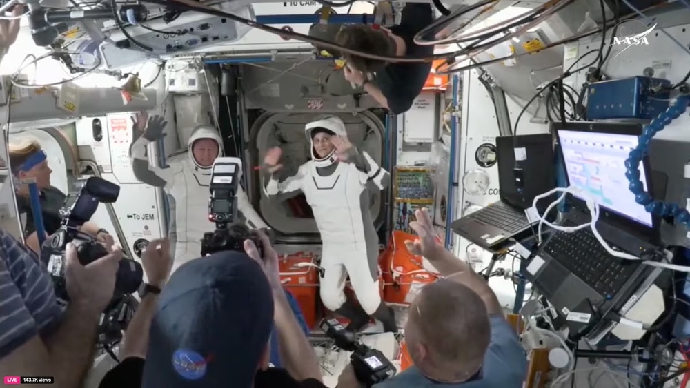 Butch Wilmore and Suni Williams, two veteran NASA astronauts who have been stuck on the International Space Station for nine months, wave at the hatch of a SpaceX Crew Dragon capsule before closing the hatch in preparation for undocking from the ISS to begin their return to Earth March 17, 2025 in this still image taken from video. NASA/Handout via REUTERS Butch Wilmore and Suni Williams, two veteran NASA astronauts who have been stuck on the International Space Station for nine months, wave at the hatch of a SpaceX Crew Dragon capsule before closing the hatch in preparation for undocking from the ISS to begin their return to Earth March 17, 2025 in this still image taken from video. NASA/Handout via REUTERS