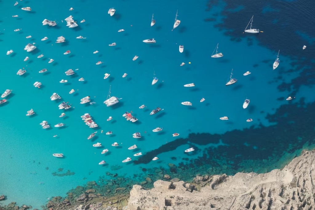 Boats gather in the waters off Favignana, Italy, September 17, 2023. Favignana was used as a filming location for Christopher Nolan’s "The Odyssey", released in Italy on July 16, 2026. REUTERS/Igor Petyx
