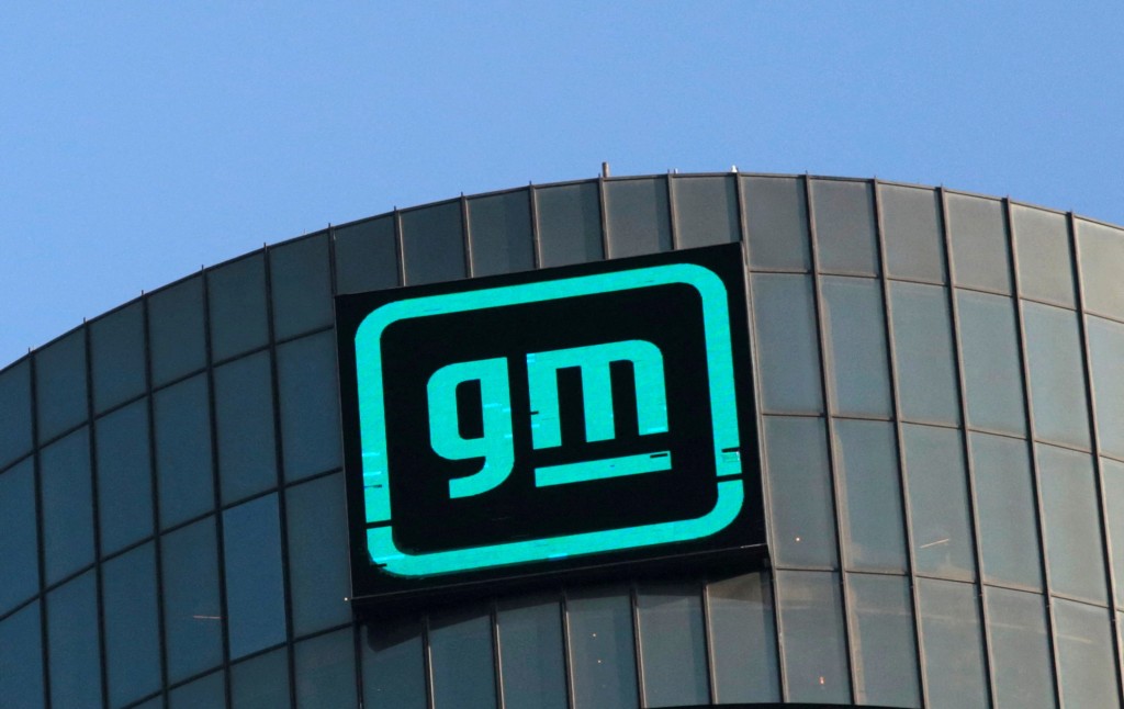 The GM logo is seen on the facade of the General Motors headquarters in Detroit, Michigan, U.S., March 16, 2021.  REUTERS/Rebecca Cook/File Photo