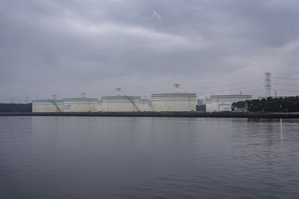 Photo by YUICHI YAMAZAKI / AFP  Oil storage tanks stand at Fuji Oil Nakasode Crude Storage Base, one of the sites designated for releasing Japan’s national oil reserves, in Sodegaura, Chiba prefecture on March 25, 2026.