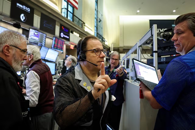 Futures-options traders work on the floor at the New York Stock Exchange's NYSE American (AMEX) in New York City, U.S., March 3, 2026. REUTERS/Brendan McDermid