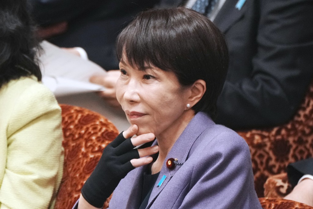 Japan's Prime Minister Sanae Takaichi listens to questions during a budget committee session of the House of Representatives in Parliament in Tokyo on February 27, 2026. (Photo by Kazuhiro NOGI / AFP)