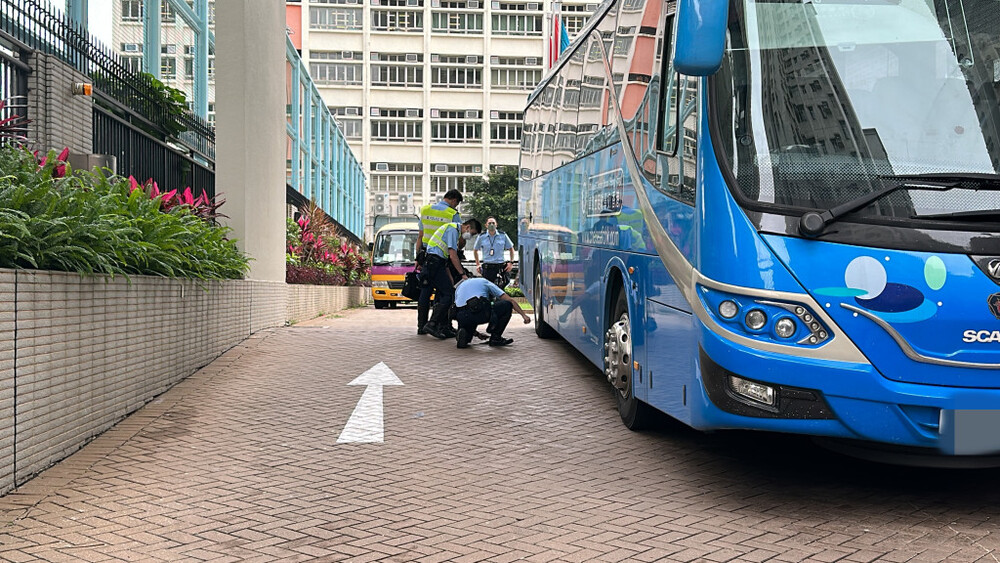Motorcyclist killed after being run over by tour bus