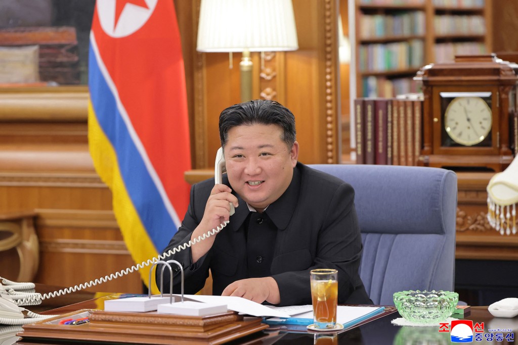  This picture taken on August 12, 2025 and released by North Korea's official Korean Central News Agency (KCNA) on August 13, 2025 shows North Korean leader Kim Jong Un holding a telephone conversation with Russian President Vladimir Putin at an undisclosed location in North Korea.  (Photo by KCNA VIA KNS / AFP)