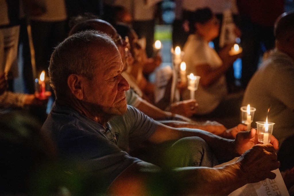 Photo by MARYORIN MENDEZ / AFP  Relatives of political prisoner Juan Pablo Guanipa take part in a vigil in front of Plaza La Republica in Maracaibo, Zulia state, Venezuela, on February 1, 2026.