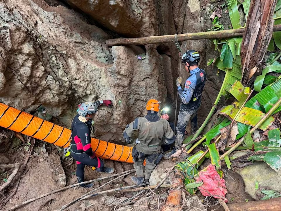 Members of a rescue team work to save seven people trapped in a cave, at a location given as Xaisomboun Province, Laos, in this handout image released May 25, 2026. Metta Tham Kalasin Rescue/Handout via REUTERS 