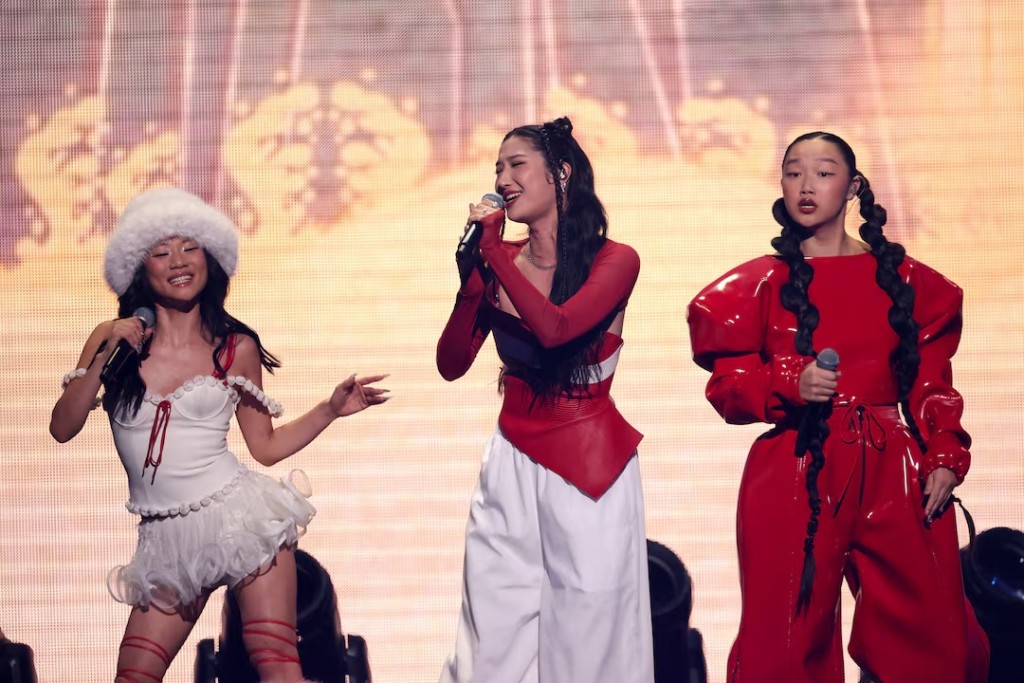 'KPop Demon Hunters' singers EJAE, Audrey Nuna, and Rei Ami perform during the iHeartRadio Jingle Ball concert in Inglewood, California, U.S., December 5, 2025. REUTERS/Mario Anzuoni