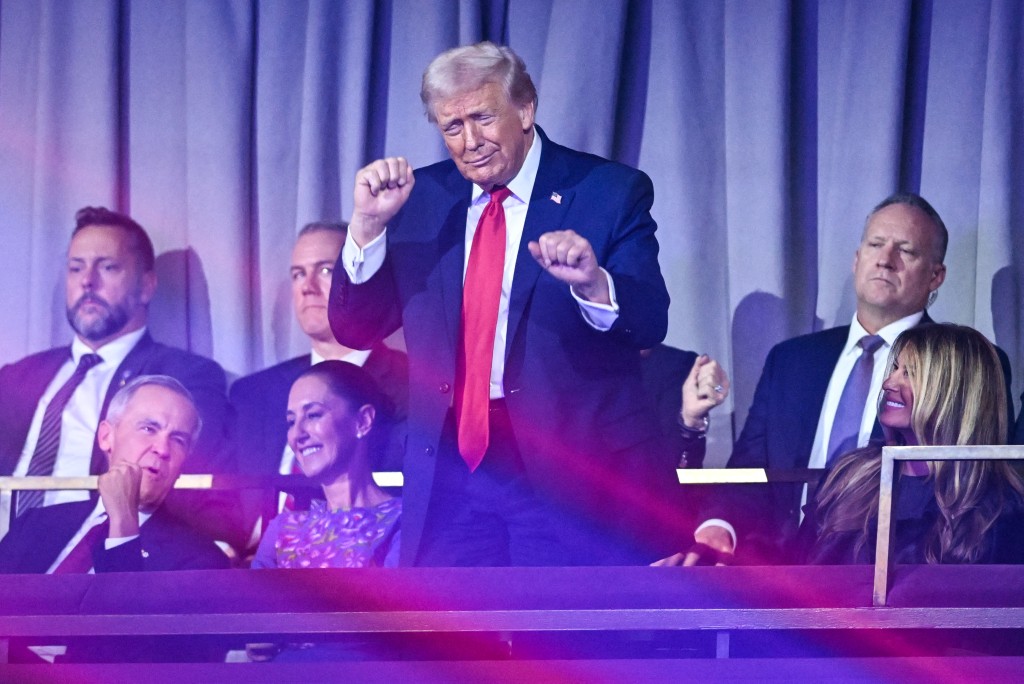 Photo by SAUL LOEB / AFP  US President Donald Trump dances after the results of the draw for the 2026 FIFA Football World Cup taking place in the US, Canada and Mexico, at the Kennedy Center, in Washington, DC, on December 5, 2025.