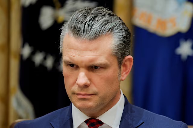 U.S. Secretary of Defense Pete Hegseth attends a cabinet meeting with U.S. President Donald Trump at the White House in Washington, D.C., U.S., December 2, 2025. REUTERS/Brian Snyder