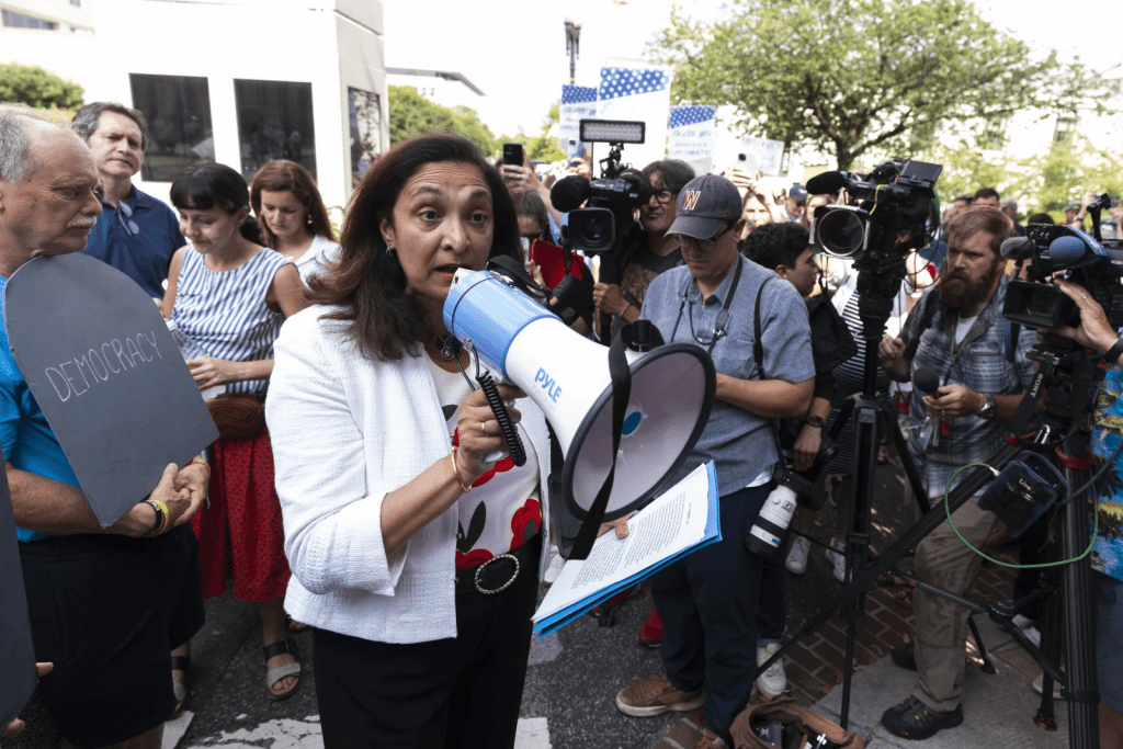 Former Under Secretary of State for civilian security, democracy, and human rights, Uzra Zeya, speaks during a rally outside the headquarters of the State Department, in Washington, Friday, July 11, 2025. (AP Photo/Manuel Balce Ceneta)