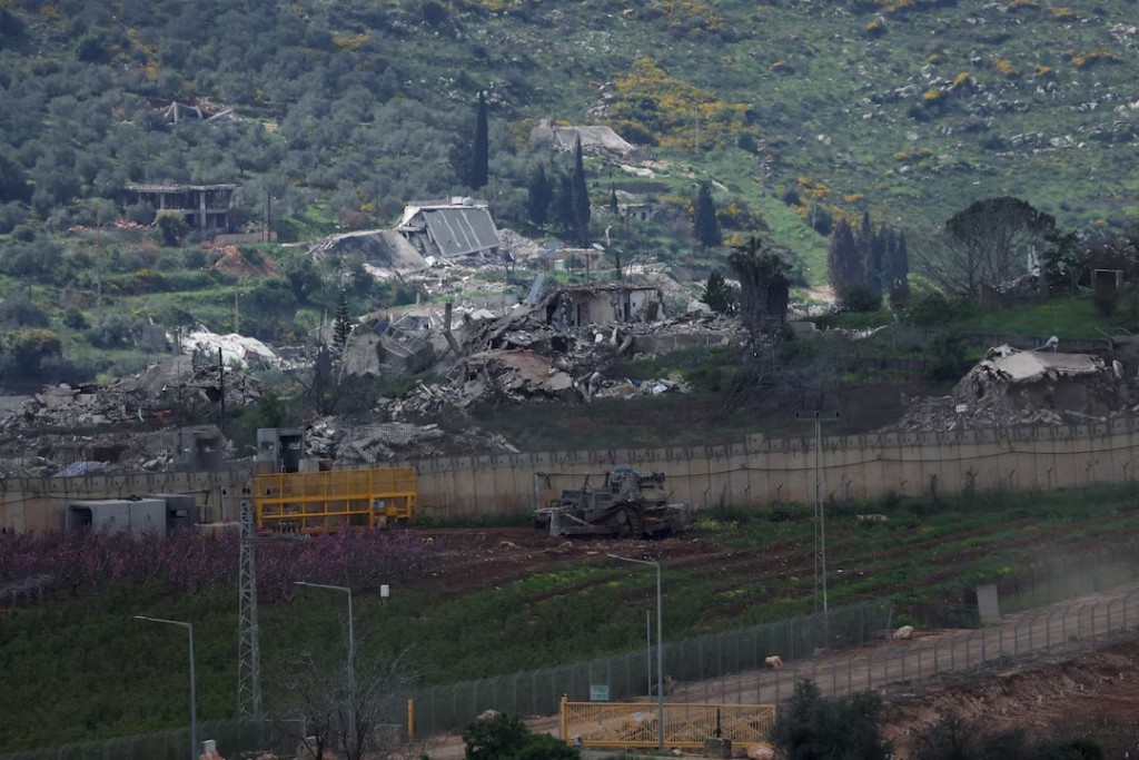  Damaged buildings at Kafr Kila following Israeli army activity across the border between Israel and Lebanon, as seen from Metula on the Israeli side of the border, April 9, 2026. REUTERS/Ammar Awad