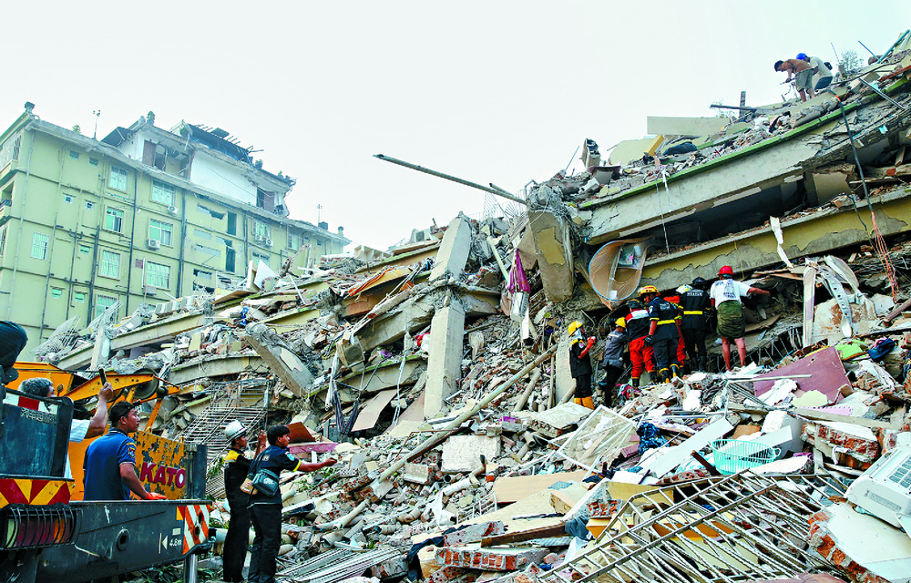 The Hong Kong team goes over its mission in Myanmar as rescuers search for survivors after Friday's killer earthquake that left the Mandalay region in shambles.
SECURITY BUREAU,
AP, XINHUA The Hong Kong team goes over its mission in Myanmar as rescuers search for survivors after Friday's killer earthquake that left the Mandalay region in shambles.
SECURITY BUREAU,
AP, XINHUA