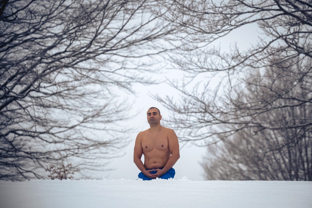 Photo by OLIVER BUNIC / AFP  Serbian archaeologist Vladimir Stevanovic, known on social media as "Serbia's Iceman", meditating on thick snow at the Besna Kobila mountain in Serbia's far south, near the city of Vranje, on January 30, 2026.