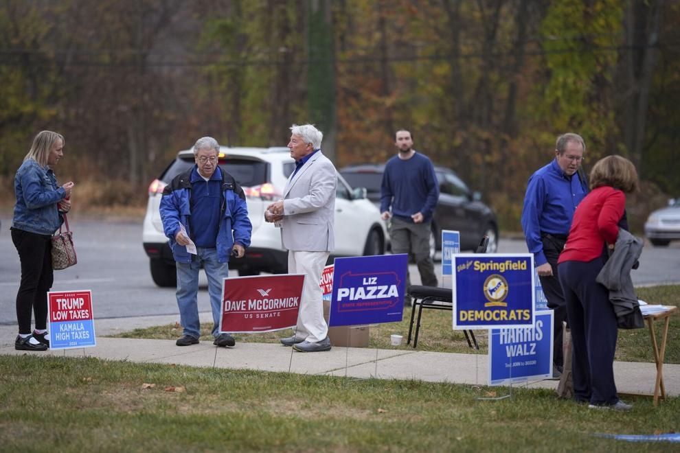 People arrive at polling place to vote, Tuesday, Nov. 5, 2024, in Springfield, Pa. ASSOCIATED PRESS People arrive at polling place to vote, Tuesday, Nov. 5, 2024, in Springfield, Pa. ASSOCIATED PRESS