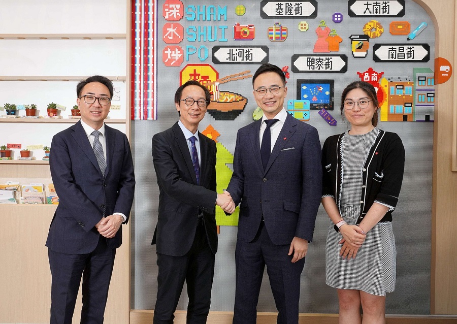 From left: Johnny Yu and Andrew Fung from Henderson Land; Boris Chan and Serena Mak from DBS at Nam Cheong Community Living Room