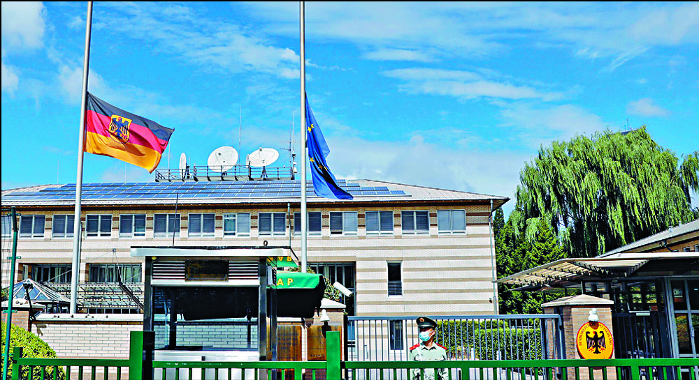 German and European Union flags fly at half-mast at Germany's embassy in Beijing after the death of Jan Hecker. REUTERS German and European Union flags fly at half-mast at Germany's embassy in Beijing after the death of Jan Hecker. REUTERS