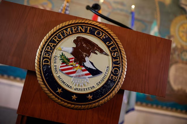 The seal of the U.S. Department of Justice at Freedom Tower in Miami, Florida, U.S., May 20, 2026. REUTERS/Marco Bello 