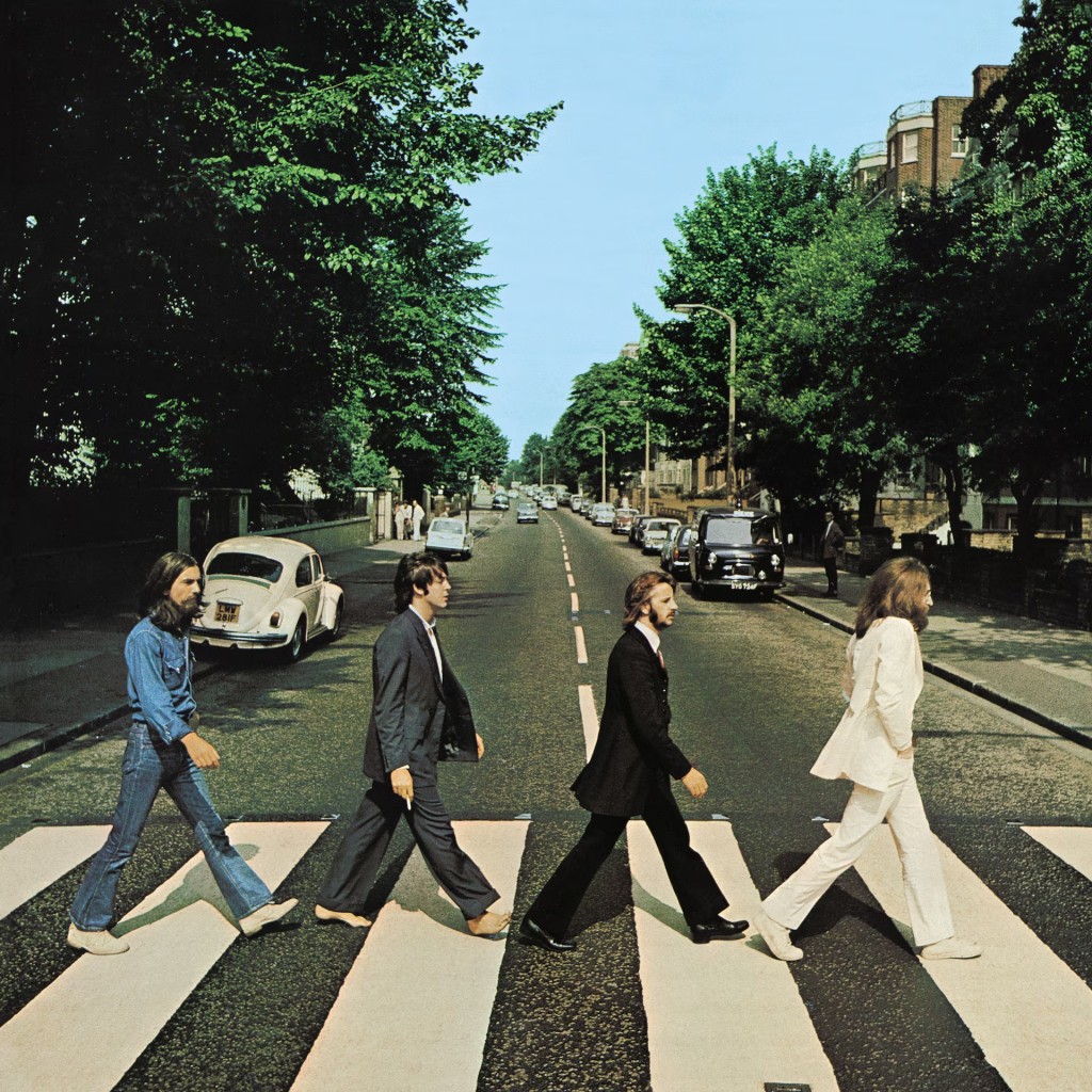 Scottish photographer Iain Macmillan took just six shots of the group on the crossing, with the fifth used as the cover of the band's 11th studio album, released on Sept. 26 1969. The picture shows Lennon in a white suit leading the group across the road. Starr wears a black suit while McCartney is barefoot, out of step and holding a cigarette. Harrison is in blue denim. A Volkswagen Beetle is parked in the background. Iain Macmillan, courtesy Apple Corps/via REUTERS 