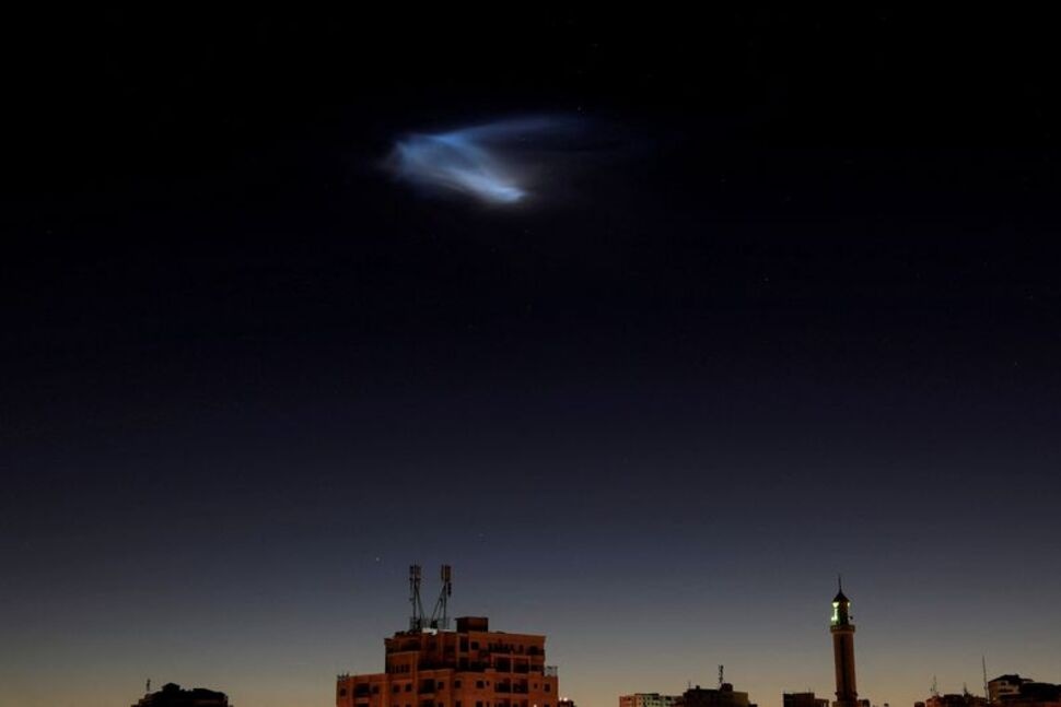 An attempt to intercept a missile launched from Iran is made, as seen from Hebron, in the Israeli-occupied West Bank, June 17, 2025. REUTERS/Mussa Qawasma