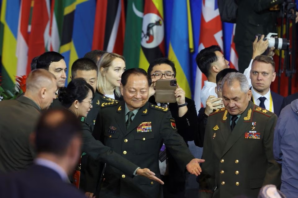 China's Central Military Commission Vice Chairperson Zhang Youxia and Russian Defence Minister Sergei Shoigu arrive for the Beijing Xiangshan Forum in Beijing. (Reuters) China's Central Military Commission Vice Chairperson Zhang Youxia and Russian Defence Minister Sergei Shoigu arrive for the Beijing Xiangshan Forum in Beijing. (Reuters)
