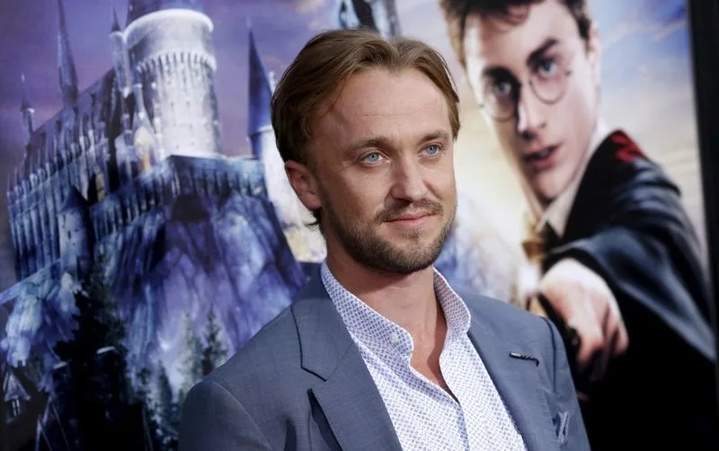 FILE PHOTO. Actor Tom Felton poses at Universal Studios Hollywood in Universal City, California, USA. April 5, 2016. REUTERS/Mario Anzuoni