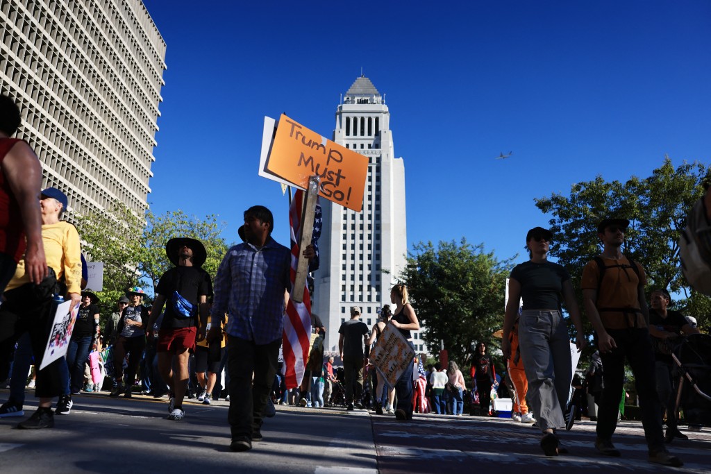 Protesters participate in the "No Kings" national day of protest in Los Angeles, California on October 18, 2025. (AFP)