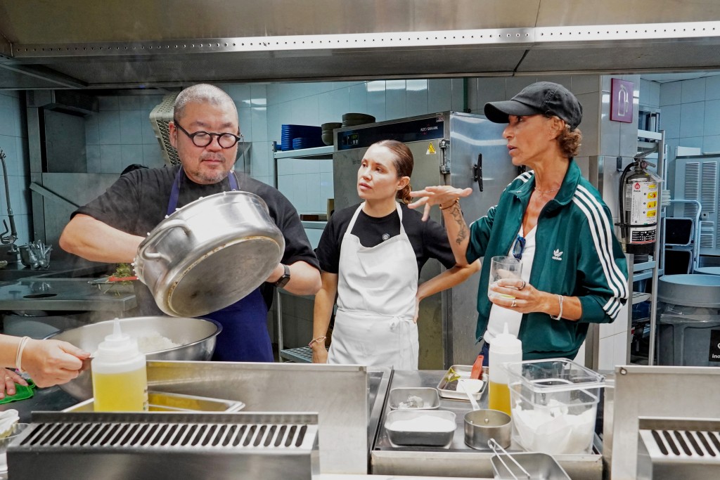 Photo by ELIZABETH RUIZ / AFP  Japanese chef Yusuke Takada (L) and chef Dominique Crenn (R) talk in a kitchen at the Xcaret resort in Playa del Carmen, Quintana Roo state, Mexico, on September 20, 2026.
