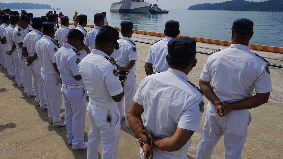 Cambodian naval members welcome U.S. warship USS Cincinnati, getting docked upon arrival at Ream Naval Base's pier in Sihanoukville Cambodia, Saturday, Jan. 24, 2026. (AP Photo/Heng Sinith)