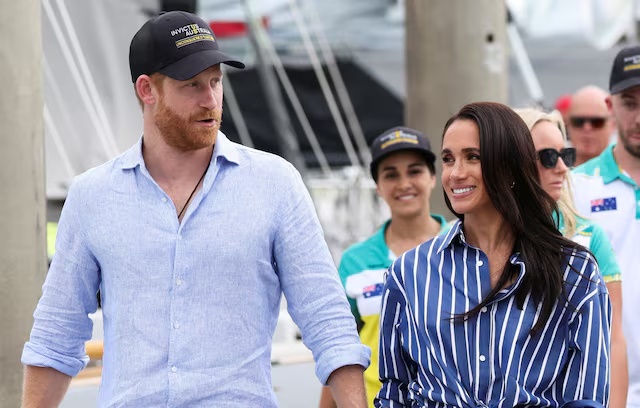 Britain's Prince Harry and Meghan, the Duke and Duchess of Sussex, arrive at Rushcutters Bay following a sail on Sydney Harbour with veterans from the Invictus Australia community, in Sydney, Australia, April 17, 2026. REUTERS/Hollie Adams/File Photo