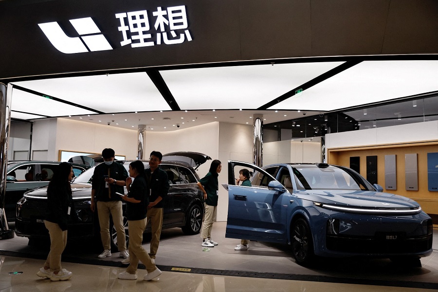 EV maker Li Auto's booth at a shopping mall in Beijing in November 2023. Photo by REUTERS EV maker Li Auto's booth at a shopping mall in Beijing in November 2023. Photo by REUTERS