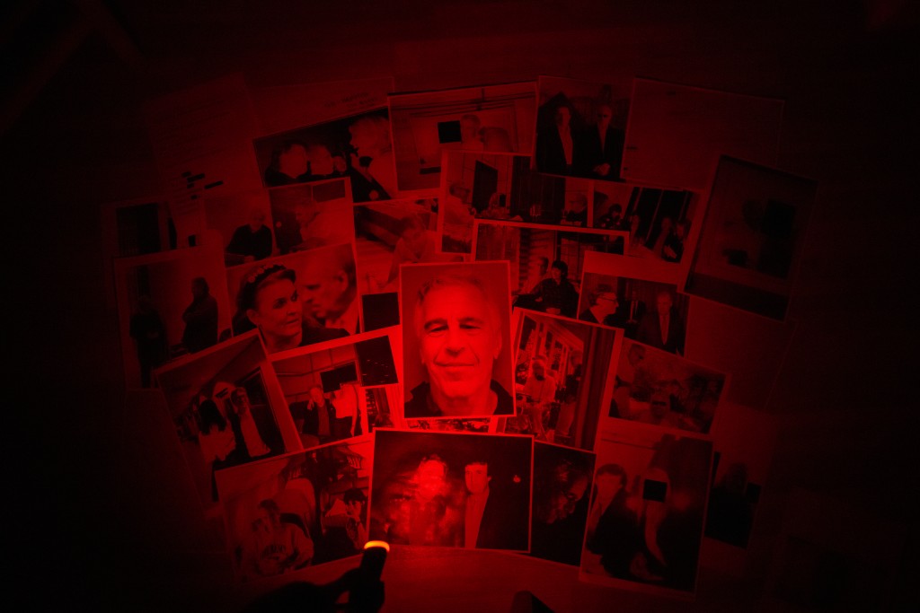 Photo by MARTIN BUREAU / AFP  This photograph taken in Le-Perreux-sur-Marne, outside Paris on February 9, 2026 shows undated pictures provided by the US Department of Justice on January 30, 2026 as part of the Jeffrey Epstein files.