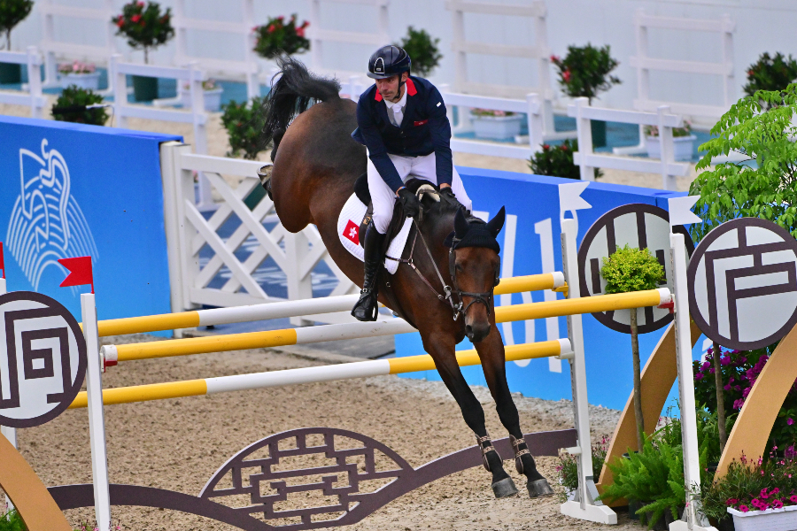 Patrick Lam competing in the equestrian competition. Patrick Lam competing in the equestrian competition.