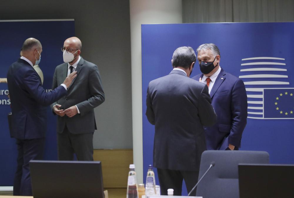 Hungary's Prime Minister Viktor Orban, right, speaks with Cypriot President Nicos Anastasiades, second right, during a round table meeting at an EU summit in Brussels, Monday, May 24, 2021. Hungary's Prime Minister Viktor Orban, right, speaks with Cypriot President Nicos Anastasiades, second right, during a round table meeting at an EU summit in Brussels, Monday, May 24, 2021.