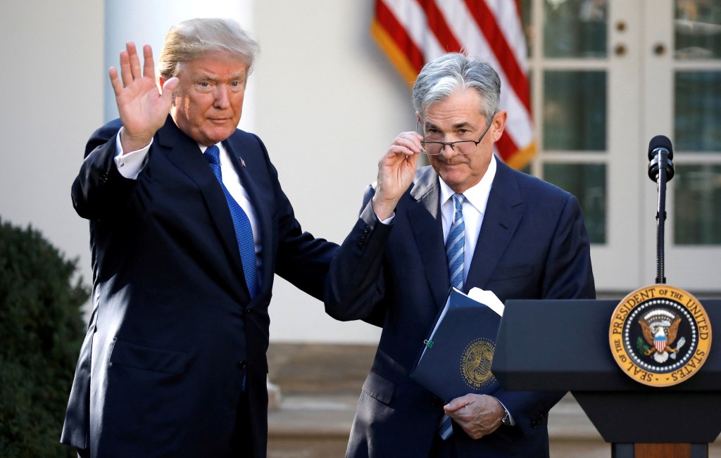 President Donald Trump gestures with Jerome Powell, his nominee to become chairman of the U.S. Federal Reserve at the White House in Washington, US, November 2, 2017. REUTERS